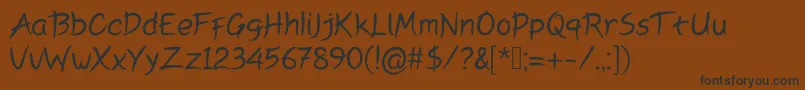 Peyoriregular Font – Black Fonts on Brown Background