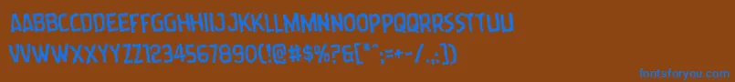Czcionka Wormcuisinerotate – niebieskie czcionki na brązowym tle