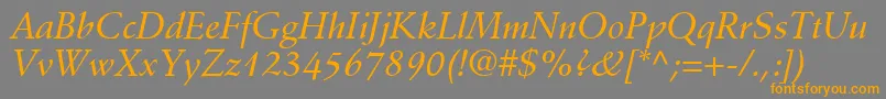 フォントDeutchMediumSsiMediumItalic – オレンジの文字は灰色の背景にあります。