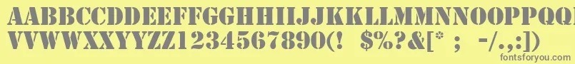 StencilLt-fontti – harmaat kirjasimet keltaisella taustalla