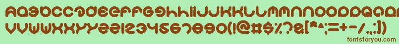 Smiley-Schriftart – Braune Schriften auf grünem Hintergrund