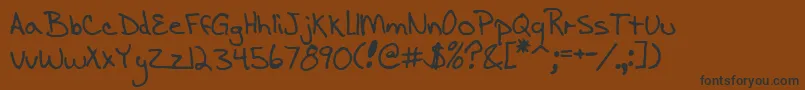 EnigmaScrawlBrk Font – Black Fonts on Brown Background