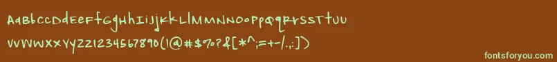フォントAmbitionInkDemo – 緑色の文字が茶色の背景にあります。