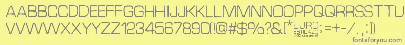 EuroEstilazo-fontti – harmaat kirjasimet keltaisella taustalla