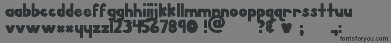 フォントMtfPorkChop – 黒い文字の灰色の背景
