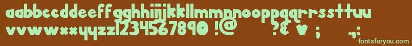 フォントMtfPorkChop – 緑色の文字が茶色の背景にあります。