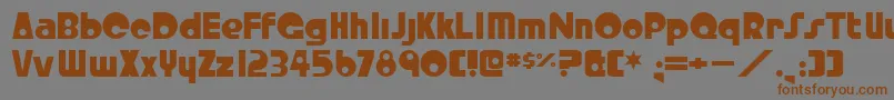 フォントCrystalRadioKit – 茶色の文字が灰色の背景にあります。