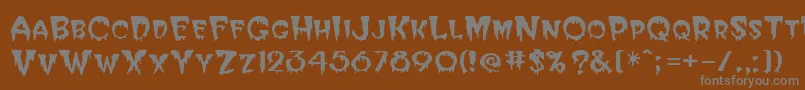 Hallween-Schriftart – Graue Schriften auf braunem Hintergrund