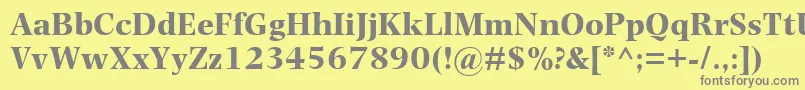 フォントPhotinaMtBold – 黄色の背景に灰色の文字