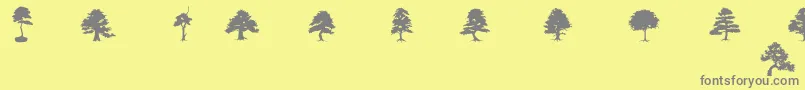 SubiktoTreeBeta-fontti – harmaat kirjasimet keltaisella taustalla