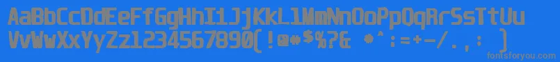 Unispaceink-fontti – harmaat kirjasimet sinisellä taustalla