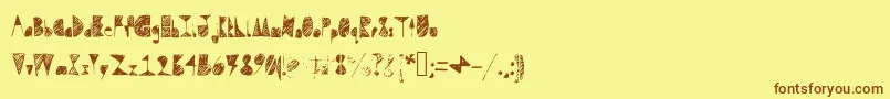 フォントQuestradoodle – 茶色の文字が黄色の背景にあります。