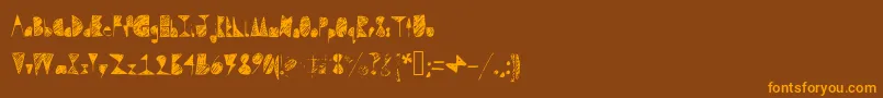 Шрифт Questradoodle – оранжевые шрифты на коричневом фоне