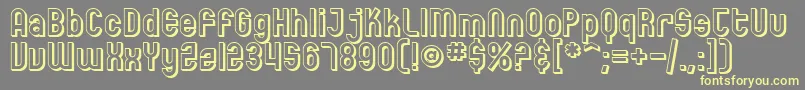SfEccentricOpusShaded-fontti – keltaiset fontit harmaalla taustalla