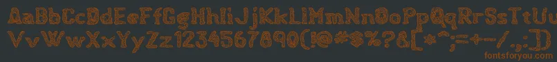 Hauntingspirits Font – Brown Fonts on Black Background