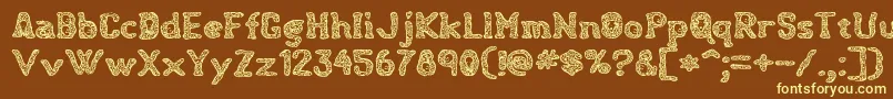 Hauntingspirits Font – Yellow Fonts on Brown Background