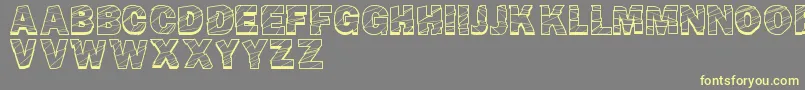 BrokenFluid Font – Yellow Fonts on Gray Background