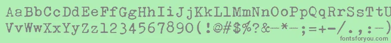 OlivettiValentine-fontti – harmaat kirjasimet vihreällä taustalla