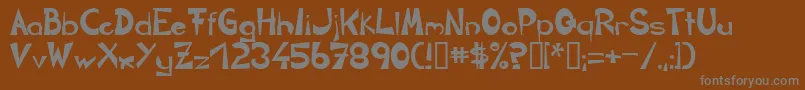 Circline-fontti – harmaat kirjasimet ruskealla taustalla