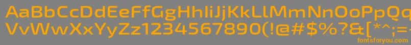 フォントExo2Semiboldexpanded – オレンジの文字は灰色の背景にあります。