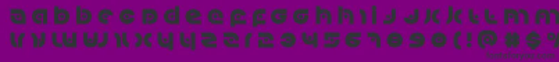 Kovacsspottitle Font – Black Fonts on Purple Background