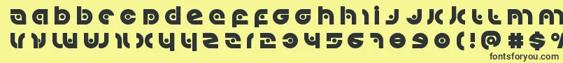Kovacsspottitle Font – Black Fonts on Yellow Background