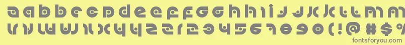 Kovacsspottitle Font – Gray Fonts on Yellow Background