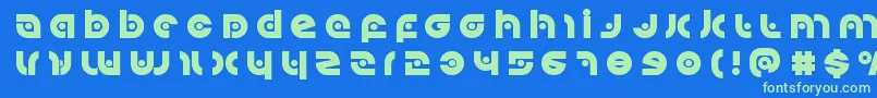 Kovacsspottitle Font – Green Fonts on Blue Background