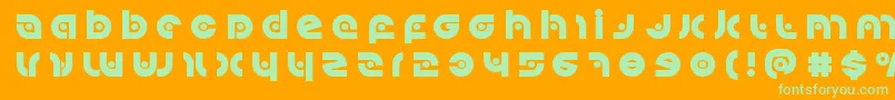 Kovacsspottitle Font – Green Fonts on Orange Background