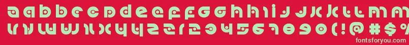 Kovacsspottitle Font – Green Fonts on Red Background