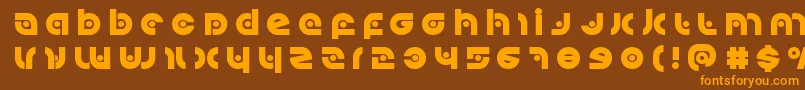 Kovacsspottitle Font – Orange Fonts on Brown Background
