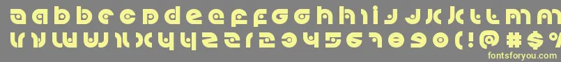 Kovacsspottitle Font – Yellow Fonts on Gray Background