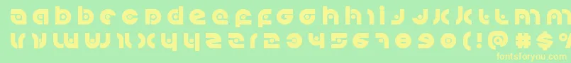 Kovacsspottitle Font – Yellow Fonts on Green Background