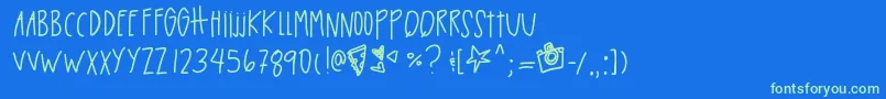 Blacktinbox-Schriftart – Grüne Schriften auf blauem Hintergrund