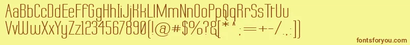 フォントLabtopWide – 茶色の文字が黄色の背景にあります。