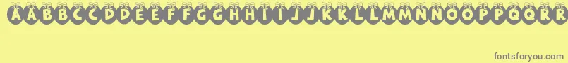 RyTha Font – Gray Fonts on Yellow Background