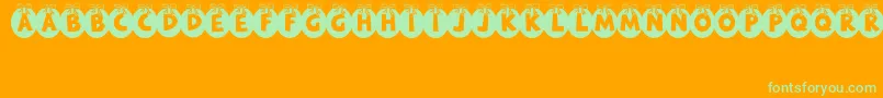 RyTha Font – Green Fonts on Orange Background