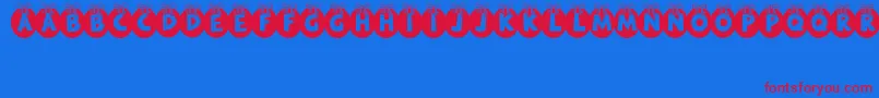 RyTha-Schriftart – Rote Schriften auf blauem Hintergrund
