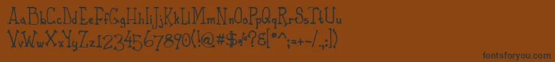 PhaetonJohn Font – Black Fonts on Brown Background