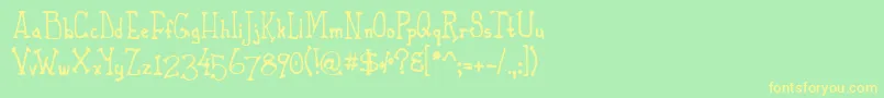 PhaetonJohn-fontti – keltaiset fontit vihreällä taustalla