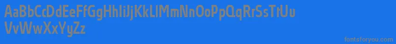 Czcionka AbsolutProMediumcondensed – szare czcionki na niebieskim tle