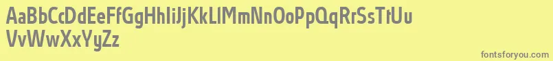 Czcionka AbsolutProMediumcondensed – szare czcionki na żółtym tle