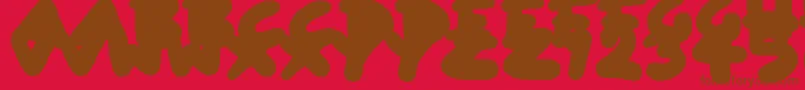 Fonte BlobToonShadows – fontes marrons em um fundo vermelho
