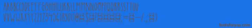 フォントDkInsomniac – 茶色の文字が青い背景にあります。
