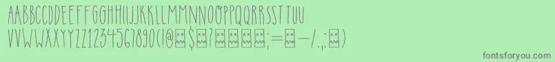 フォントDkInsomniac – 緑の背景に灰色の文字