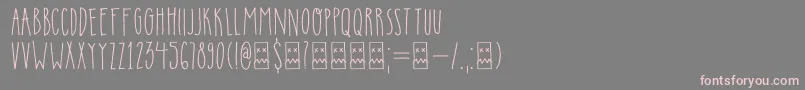 フォントDkInsomniac – 灰色の背景にピンクのフォント