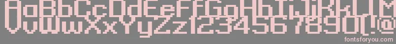 フォントKyrou9RegularBold – 灰色の背景にピンクのフォント