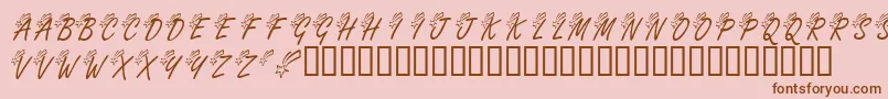 KrShootingStarLeft-Schriftart – Braune Schriften auf rosa Hintergrund