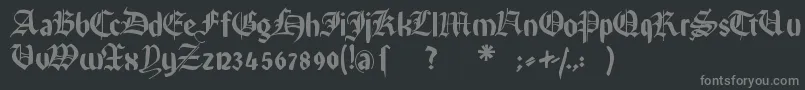 Rememberreinerfs-fontti – harmaat kirjasimet mustalla taustalla