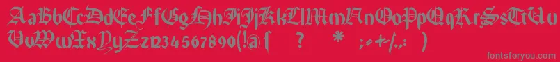Rememberreinerfs-fontti – harmaat kirjasimet punaisella taustalla